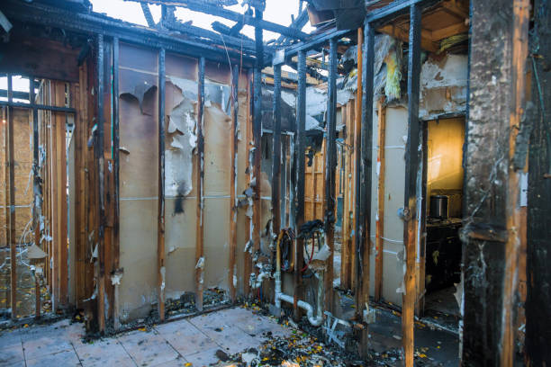 Professional Fire Damage Restoration technician working in Holly, MI